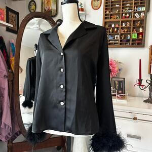 Going out top with feather cuffs